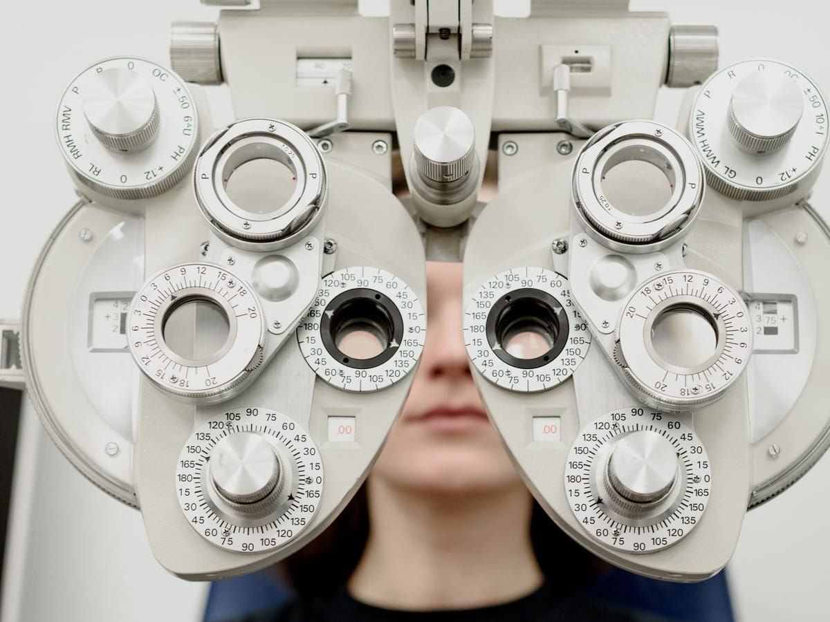 Optician refraction exam with a phoropter
